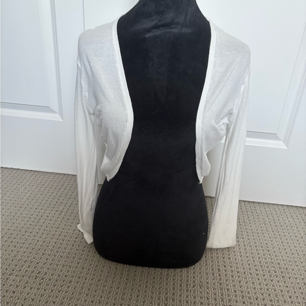 White Crop sweater . Arm coverage